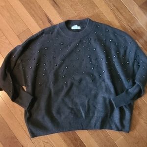 Sweater with embellishments